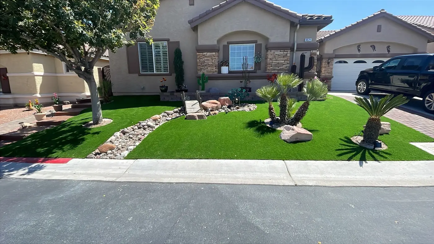 Front yard with desert plants and turf