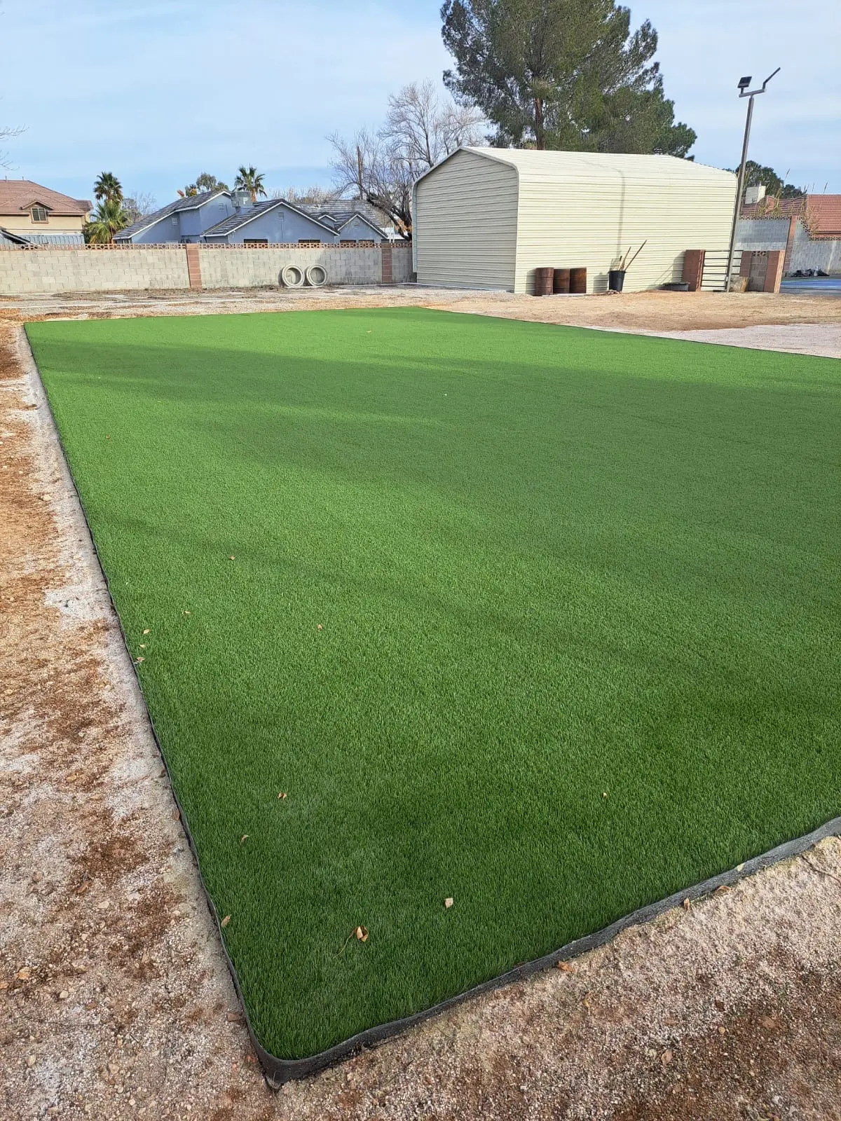 Wide, flat artificial turf area ready for sports