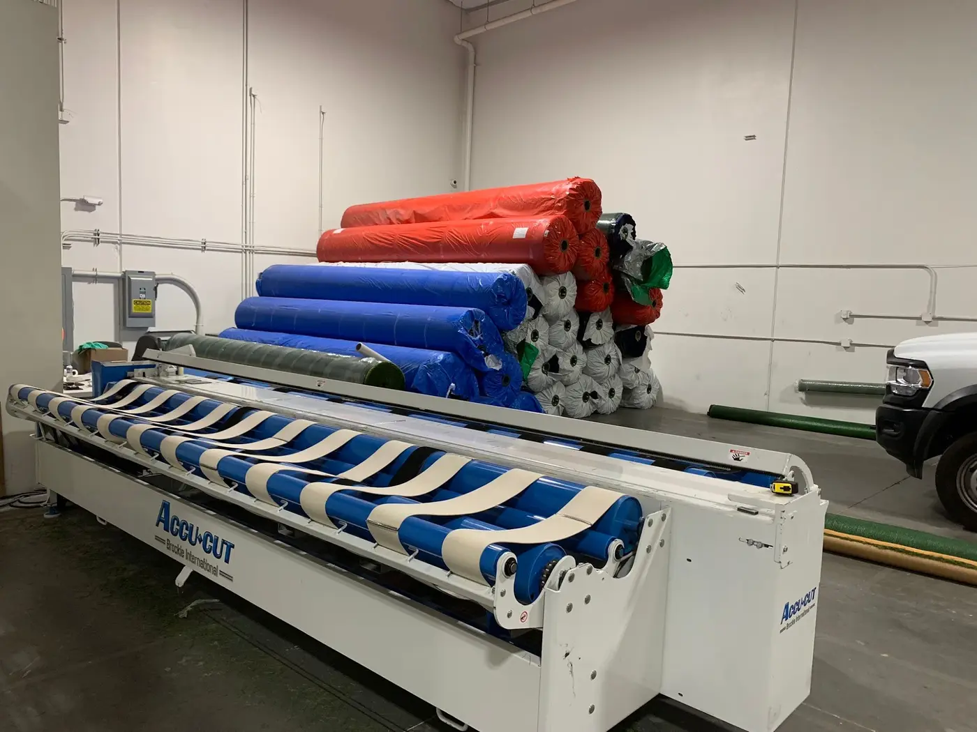 Artificial turf rolls being produced